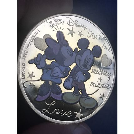 Genuine Mini and Micky gold plated coin comes in a protective plastic case