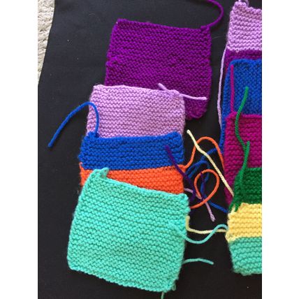 12 knitted squares in Various Colours