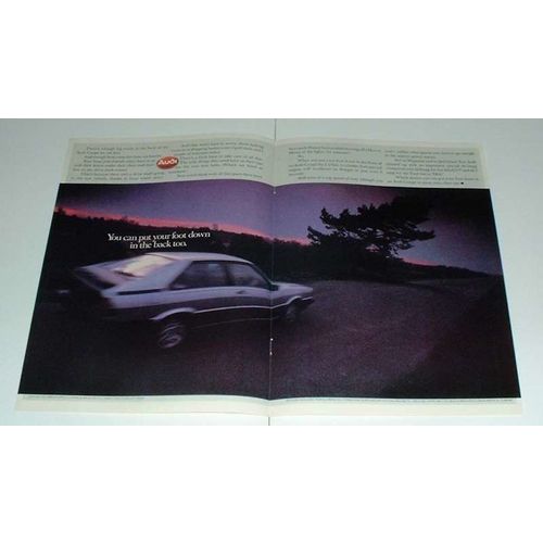 1984 2-page Audi Coupe Car Ad - Put Foot Down