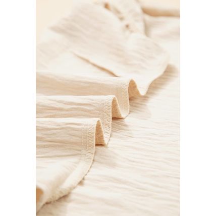 Parchment Textured Frilly Trim V Neck Sleeveless Top
