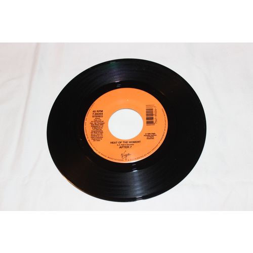 After 7 45 & Picture Sleeve-HEAT OF THE MOMENTx2 STEREO