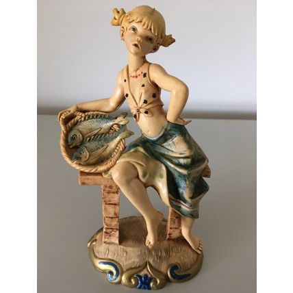 VINTAGE DEPOSE FIGRINE- GIRL WITH FISH BASKET