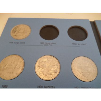 Whitman coin folder- Canada - Dollar - 1968/1984 - with 12 coins - NOT COMPLETE