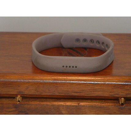 Pre-Owned Slim Grey Fitbit Smartband (For Parts)