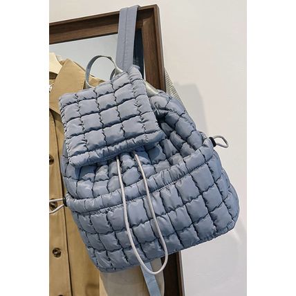 Dusk Blue Solid Flapped Quilted Puffer Backpack