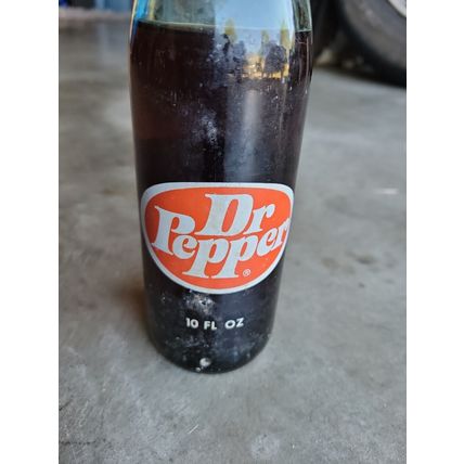 Dr Pepper Green Glass 1980 Partially Full 10 Oz Reno NV Painted Label Rusty NOS