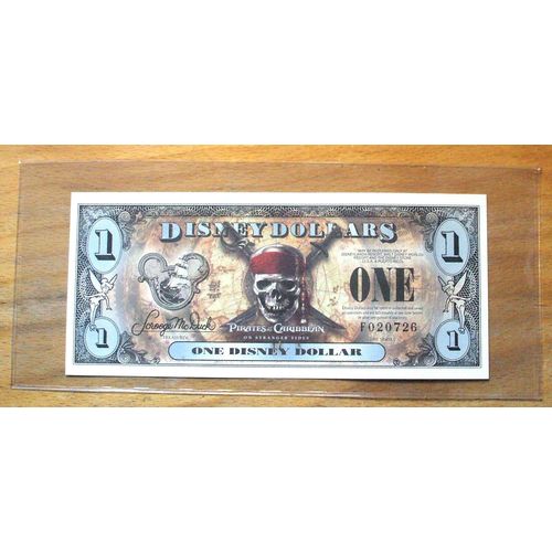 2011 DISNEY DOLLAR- $1. Mint Condition - Pirates of the Caribbean - "F" Series