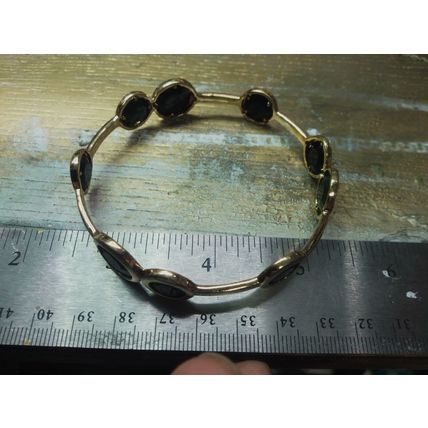 KATE SPADE NEW YORK GOLDEN METAL AND BLACK ACRYLIC STONES BANGLE CUFF BRACELET