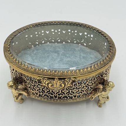 Vintage Gold Filigree Oval Ormolu casket Hollywood Regency style Cherubs Footed