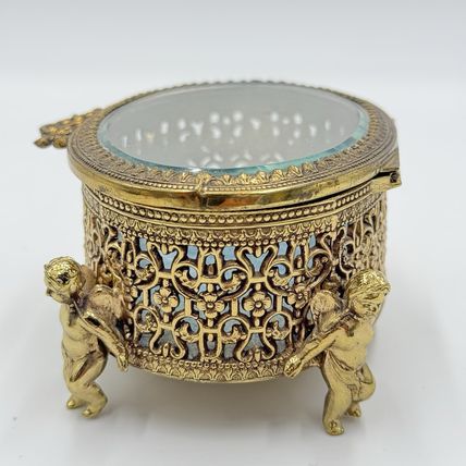 Vintage Gold Filigree Oval Ormolu casket Hollywood Regency style Cherubs Footed