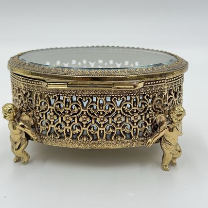 Vintage Gold Filigree Oval Ormolu casket Hollywood Regency style Cherubs Footed