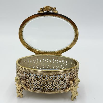 Vintage Gold Filigree Oval Ormolu casket Hollywood Regency style Cherubs Footed