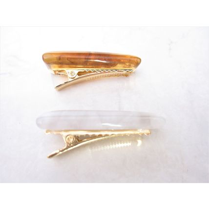 1 1/2 inch smaller white or amber brown alligator hair clip for fine thin hair.