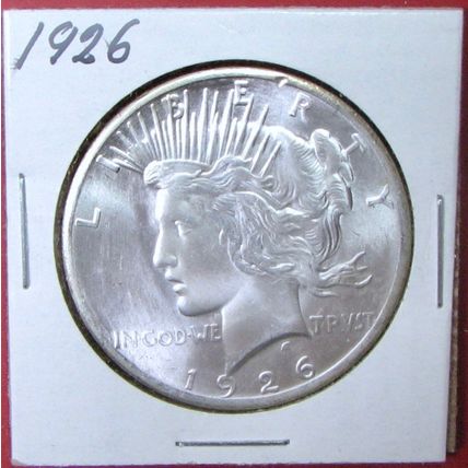 1926 Peace Dollar. This Coin is a replica and contains NO precious metal.