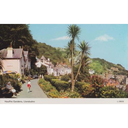 Girl Approaching Elderly OAP Citizens Haulfre Gardens Llandudno 1970s Postcard