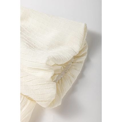 White Textured Bow Ties Front Bubble Hem Puff Short Sleeve Blouse