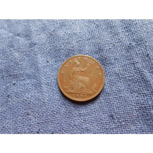 1884 BRITISH FARTHING COIN.