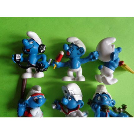 Job lot of 9 modern smurfs baseball player cb radio fries telephone