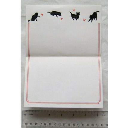 Vintage: unused notepaper embosed black cats chasing butterflies