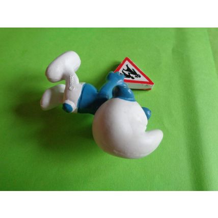 Smurf with a children crossing traffic safety sign