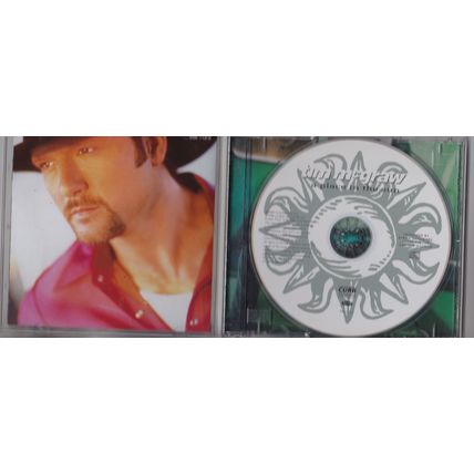 Tim McGraw : A Place In The Sun. (1999) CD album.
