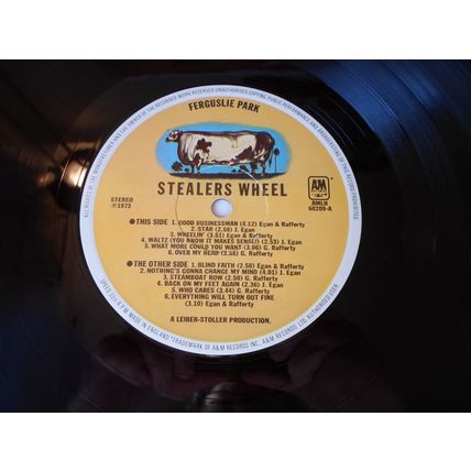 LP. 1973.STEALERS WHEEL.FERGUSLIE PARK,AM LH68209. LYRIC INNER.TRAN RED VINYL.NM