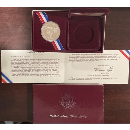 1983-S Los Angeles XXIII Olympiad Games Proof Silver Dollar. DISCUS Box & COA