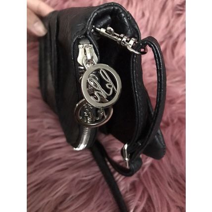 Kate Hill crossbody women's black handbag. Can be folded