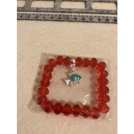 Red glass rondelle elastic bracelet with silver plated charm