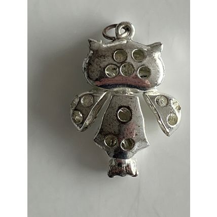 SILVER METAL CHARM WITH ARTICULATED HEAD & WINGS