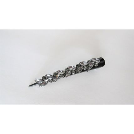 Black alligator hair claw clip with clusters of gray crystals