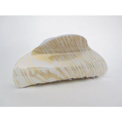 Long creme white blonde and gold hair claw clip