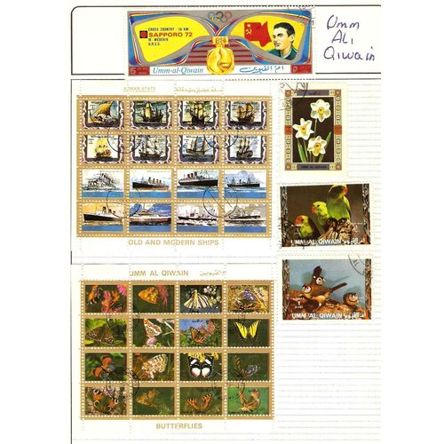 Um Al Qiwain album page 36 commemoratives with 2 mini sheets ships & butterflies