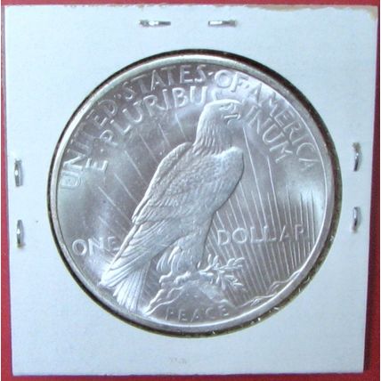 1927 Peace Dollar. This Coin is a replica and contains NO precious metal.