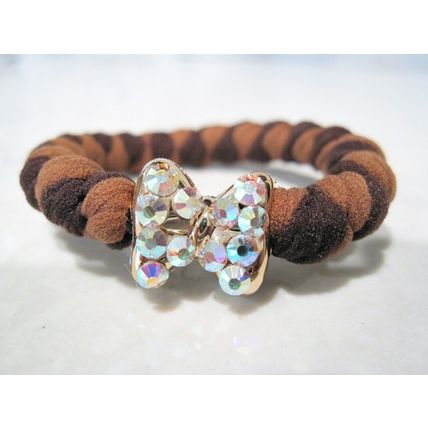 Bow shaped hair tie pony tail holder with swarovski crystals