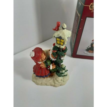 the Beasley Family Collection teddy bears caroling by a light pole