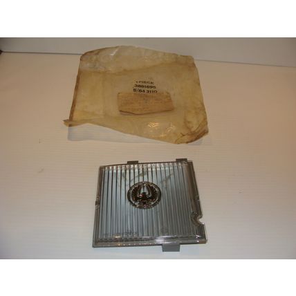 1977 1978 CHRYSLER LEBARON LH HEADLIGHT APPLIQUE NOS #3881695 SOP 3881697