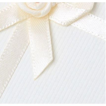 Ivory colour gift box approx 8 cm x 6.5 cm x 2 cm