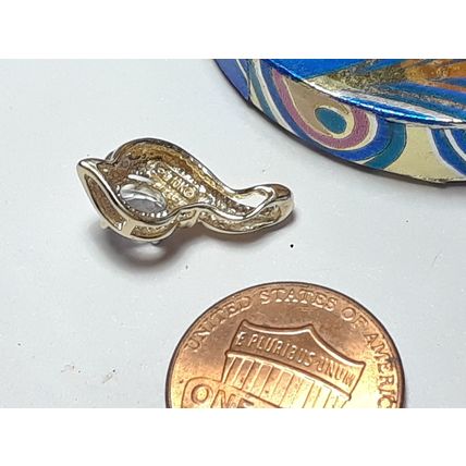 45ctw Natural Sky Blue Oval Topaz & Diamond 10Kt Yellow Gold Swirl Pendant18699