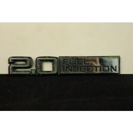 1980-1990 Chevrolet Pontiac Cadillac “2.0 Fuel Injection” Side Emblem OEM