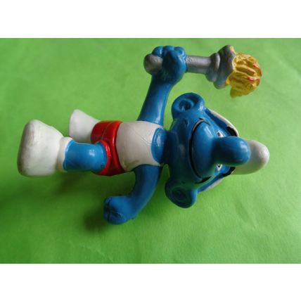 Olympic running smurf with torch flame