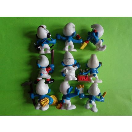 Job lot of 9 modern smurfs baseball player cb radio fries telephone
