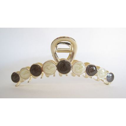 Long gold metal and gray and white marble hair claw clip