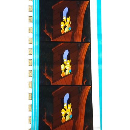 Simpsons Movie. Pk FE FE - 051Y. 1 STRIP OF 5 - 35MM FILM CELLS