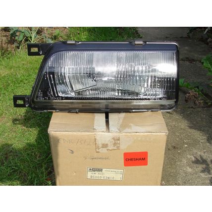 NISSAN SUNNY N13 NEARSIDE HEADLIGHT > NEW UK part