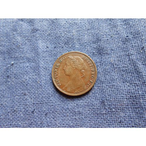 1884 BRITISH FARTHING COIN.