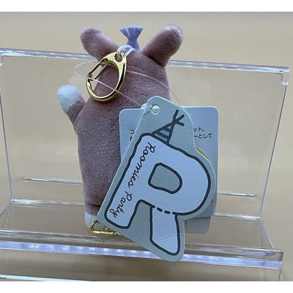 A Very Cute Rare NWT Roomies Party anteater/pig keychain