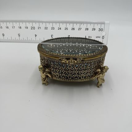 Vintage Gold Filigree Oval Ormolu casket Hollywood Regency style Cherubs Footed