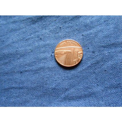2010 BRITISH ONE PENNY ERROR COIN./1
