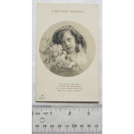 1912 postcard A Birthday Greeting - Girl Holding Flowers